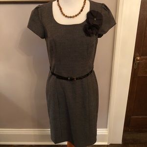 Sweet fully lined dress- belt with flower detail.